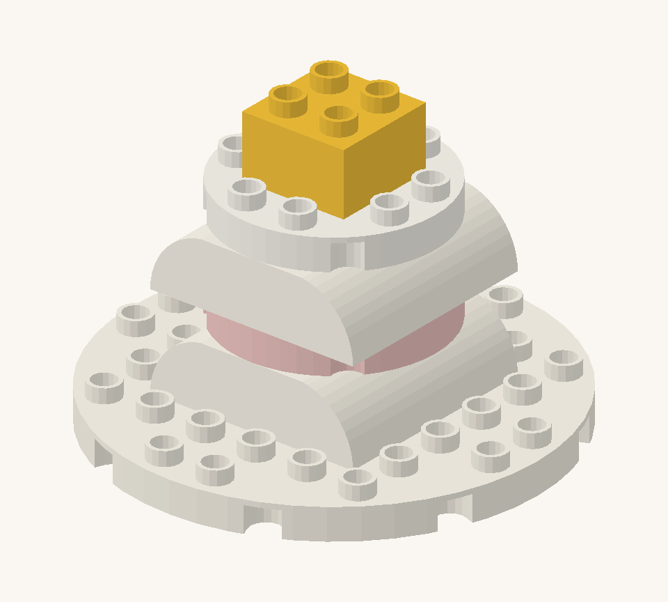 Cover the cake with the white round plate for icing. Centre the yellow square on it as a chunky birthday candle. New additions are shown in their original colours; earlier pieces are lighter.