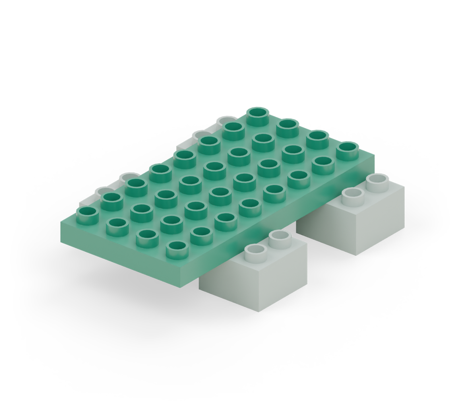 Step 2: Lay a green 4 × 8 plate across the four feet, running from back to front. Each foot projects one column outside the plate.