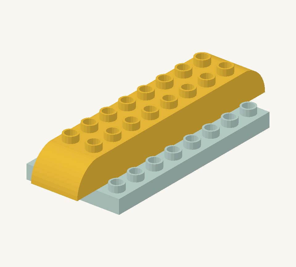 Lay a yellow long brick along the centre, two rows from the back. Add yellow curves at both ends with their rounded ends pointing outward. New additions are shown in their original colours; earlier pieces are lighter.