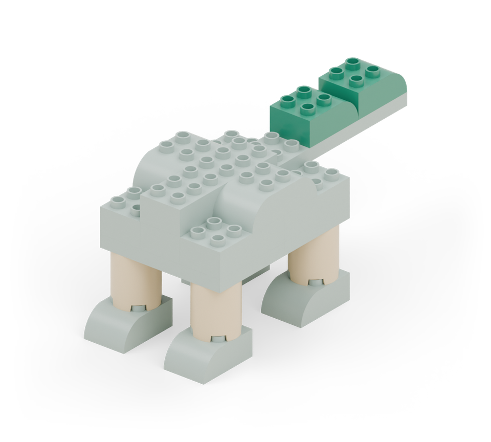 Cover the back six rows of the tail with two green curved bricks, pointing backward. New additions are shown in their original colours; earlier pieces are lighter.