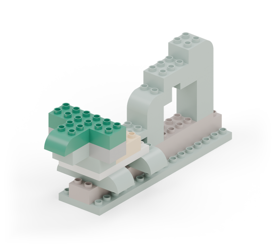 Step 12: Cover the eyes with a green 2 × 6 brick across the head. Put a green curved brick on the front of the jaw, rounded end forwards.