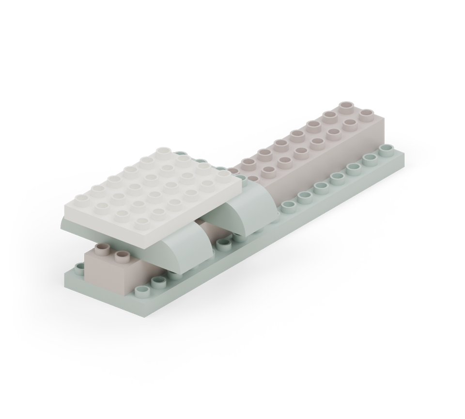 Step 4: Lay a white 4 × 6 plate across the feet, running from back to front. Its back edge is two rows from the back of the front green floor plate.