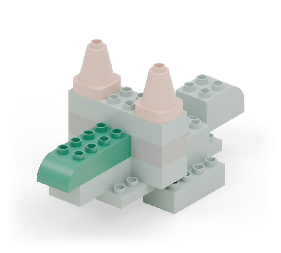 Step 10: Put a green square on the back half of the jaw and a green curved brick on the front half, rounded end forwards.