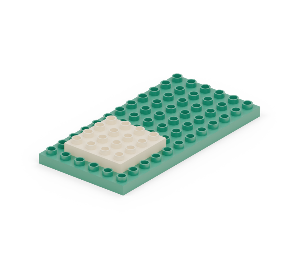 Set the green large base plate lengthways for the woodland garden. Add the cream square porch plate near the front, one row in from both sides and the front edge.