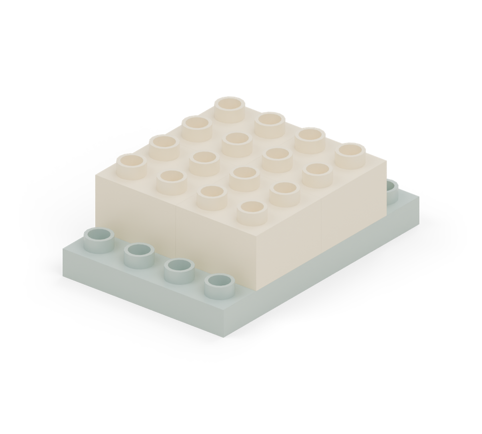 Start the tower with four cream square bricks, leaving one clear row at the front and back of the green plate.
