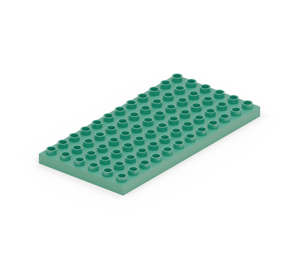 Set down the green six-by-twelve base plate with its long edge running away from you.