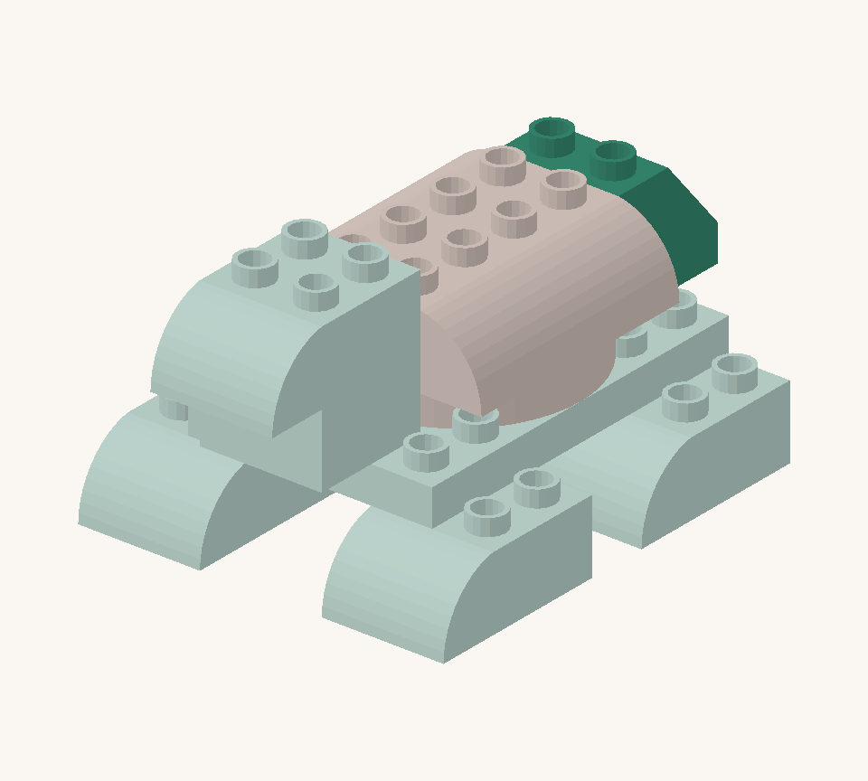 Finish with the small green slope at the back. Its high row attaches to the body and its low end points backward as the tail. New additions are shown in their original colours; earlier pieces are lighter.