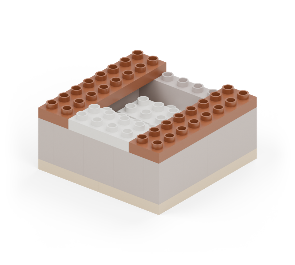 Step 8: Cover each side wall with a brown 2 × 8 plate. Line up its outside edge with the tray; the inner column projects over the opening.