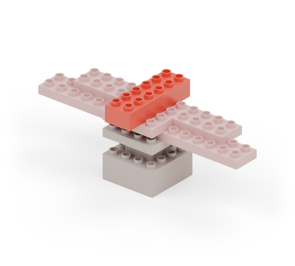 Step 6: Put a red 2 × 6 brick down the middle, starting one row behind the rock and reaching one row in front.