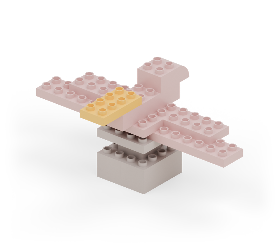 Step 8: Put a yellow 2 × 4 plate on the front of the body. Its back two rows overlap and its front two rows project forwards.
