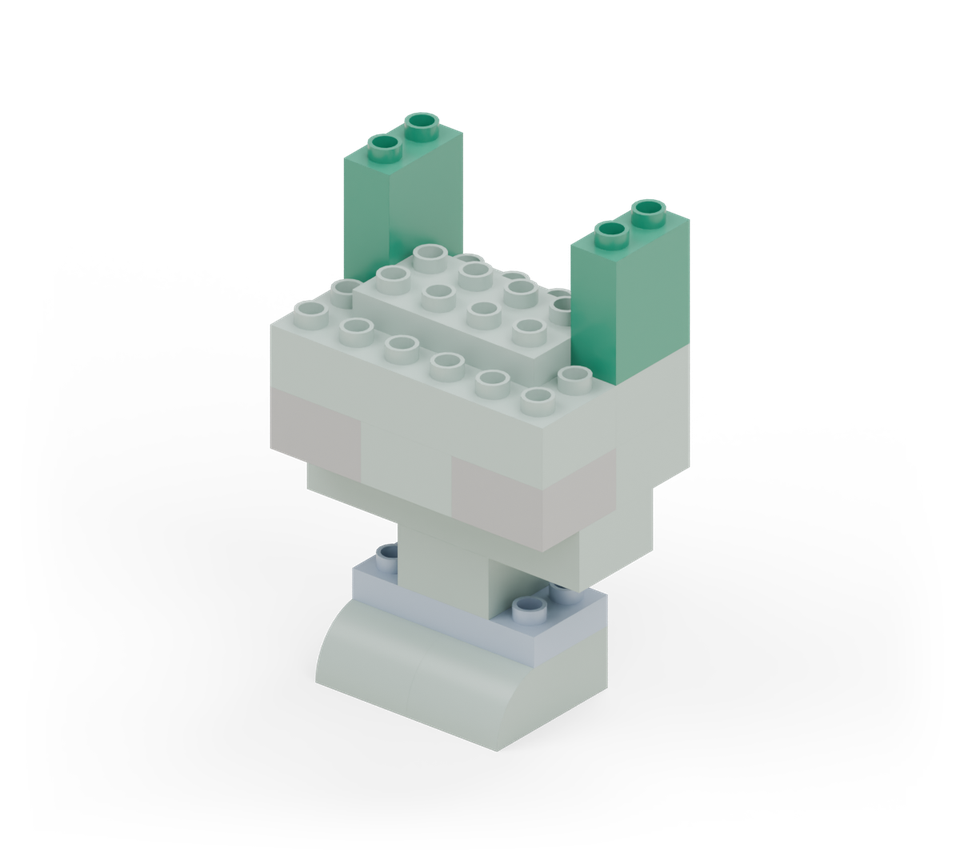 Step 9: Stand a green narrow double-height wall brick along each outside column at the back of the head. Each runs over the back two rows.